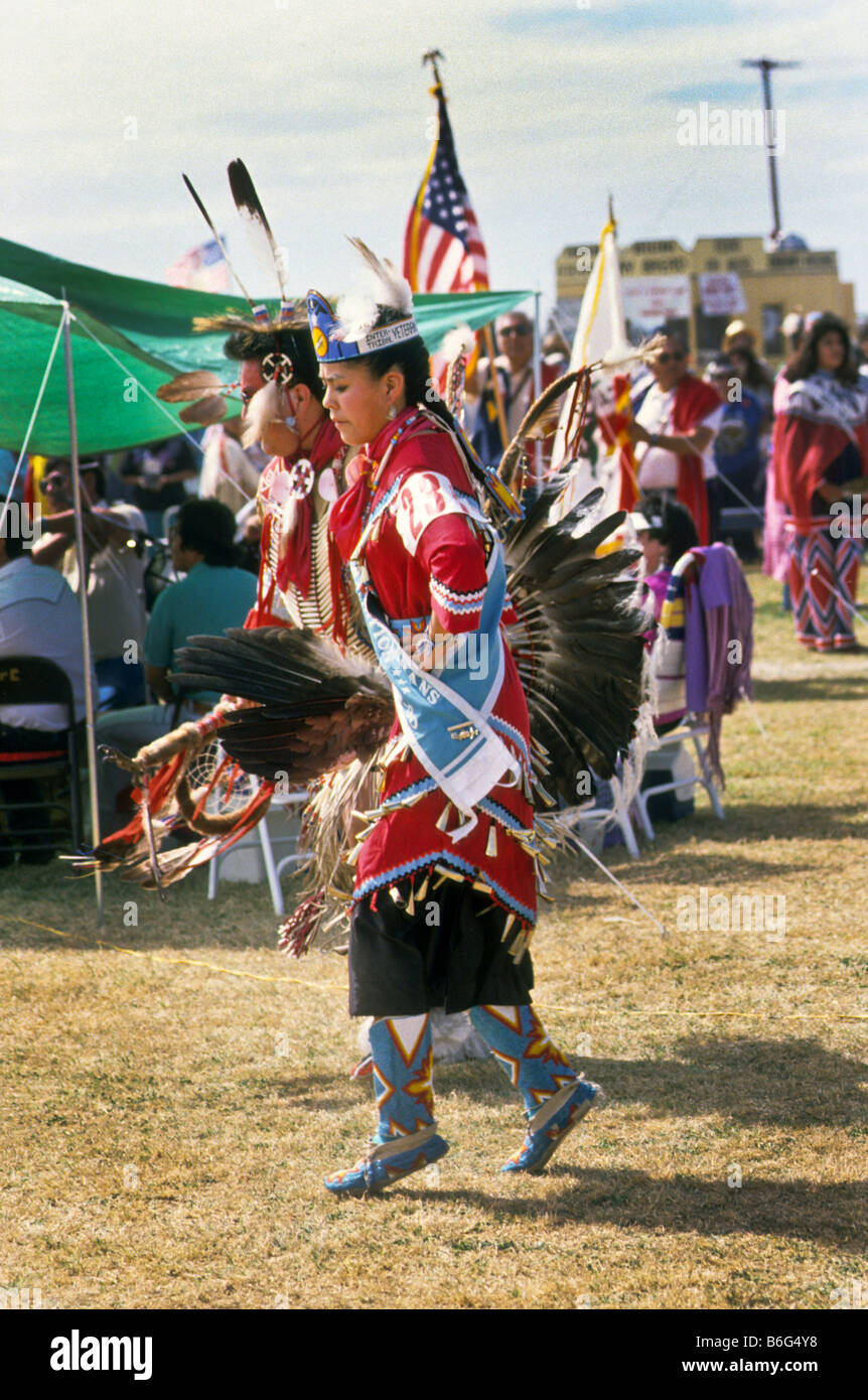 Native American Indians celebrate and dance at powwow. Stock Photo