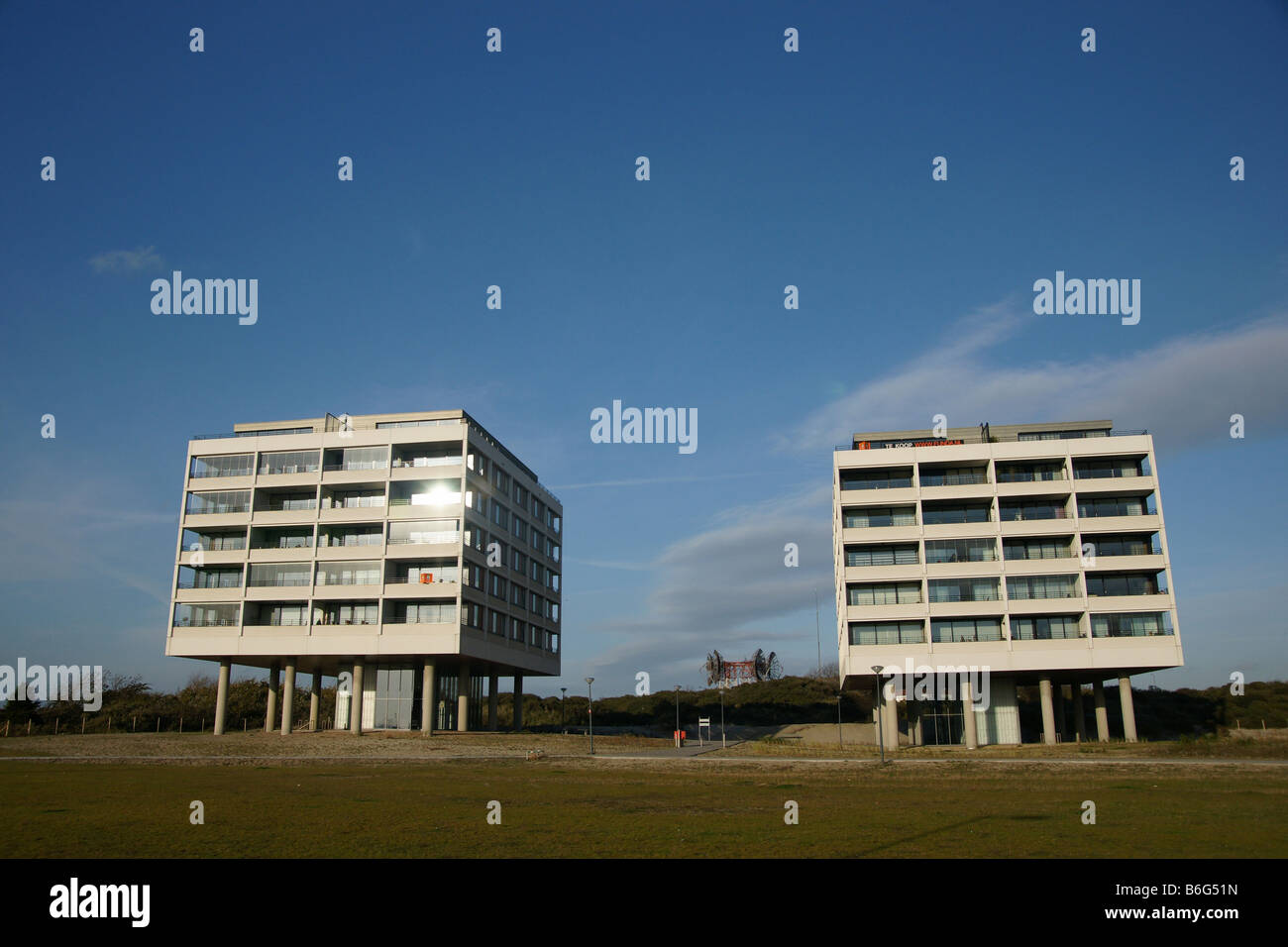 Two modern cubic houses flat apartments buildings under blue sky in Hoek van Holland Netherlands Stock Photo