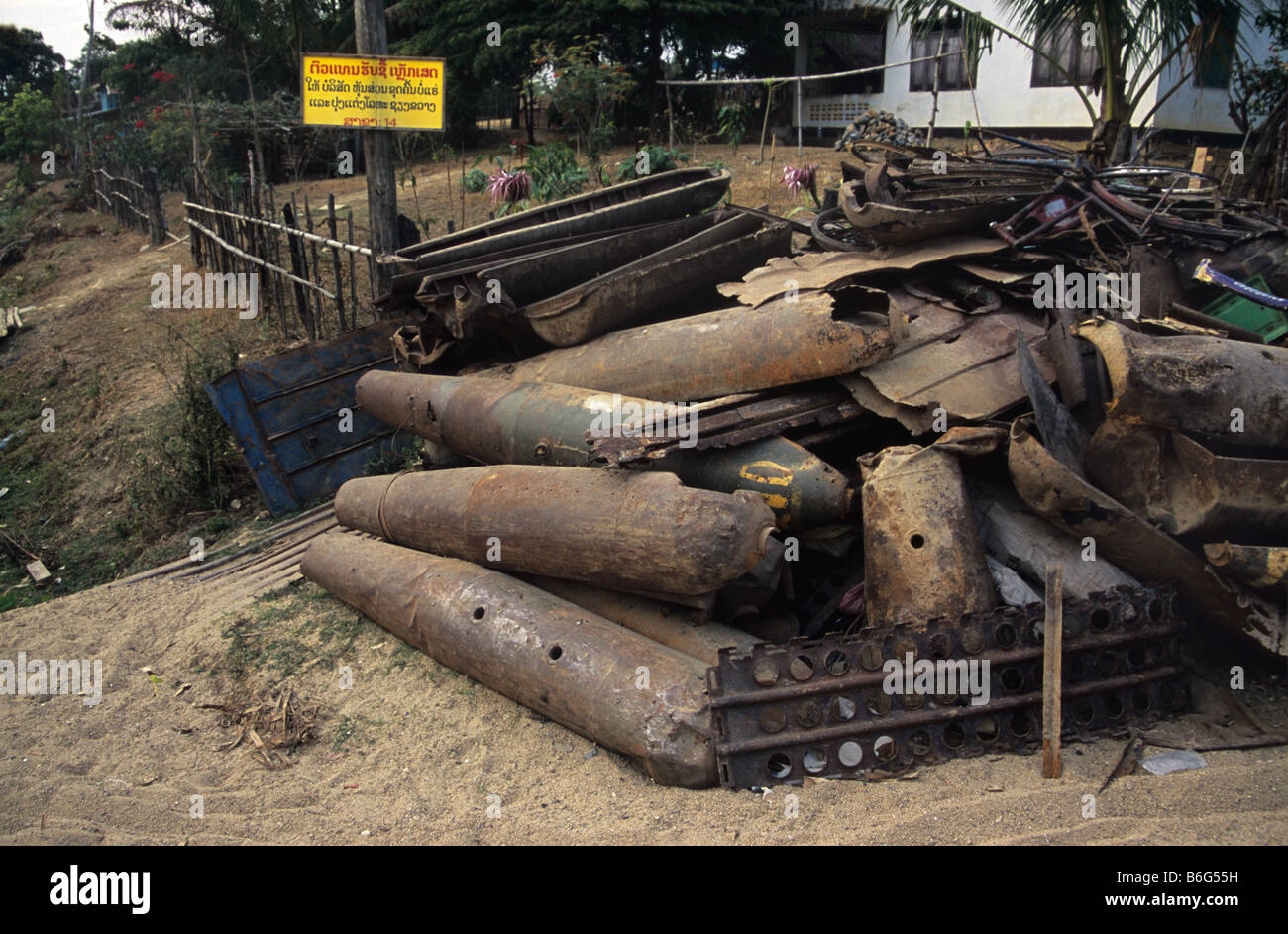 Scrap metal yard with US Vietnam War-era war scrap, cluster bomb casings and missiles, Phonsavan, Laos Stock Photo