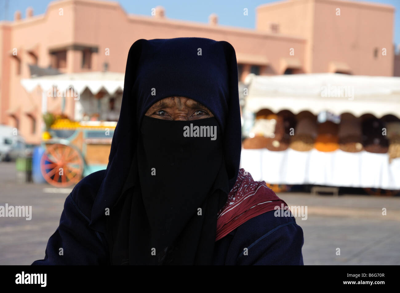 Portrait of a Berber Woman at Djemaa el Fna square in Marrakech Stock Photo
