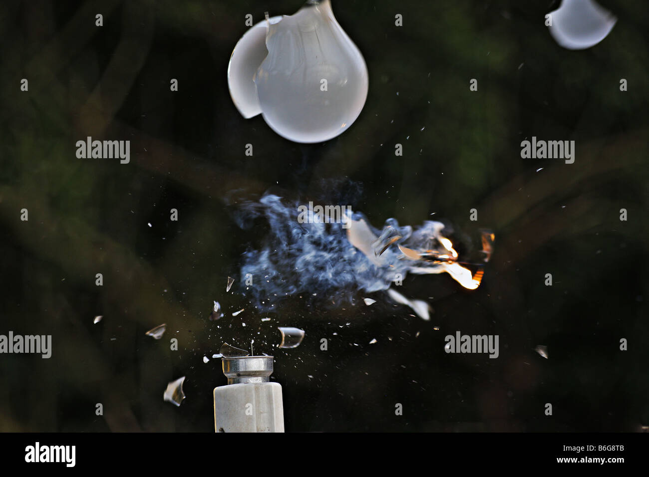 Exploding light bulb Stock Photo