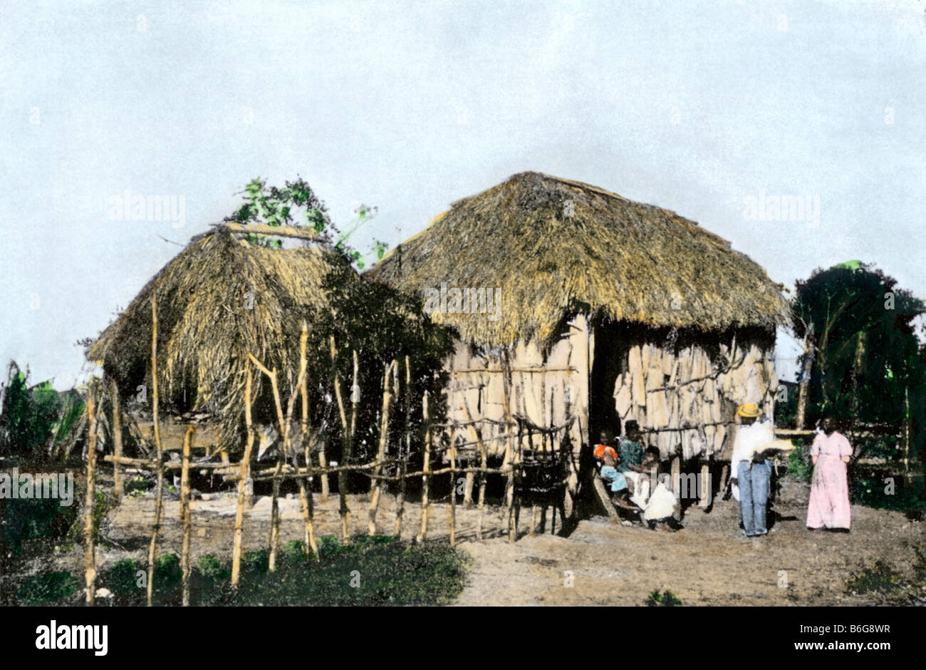 Native houses in rural Puerto Rico 1890s. Hand-colored halftone of a photograph Stock Photo
