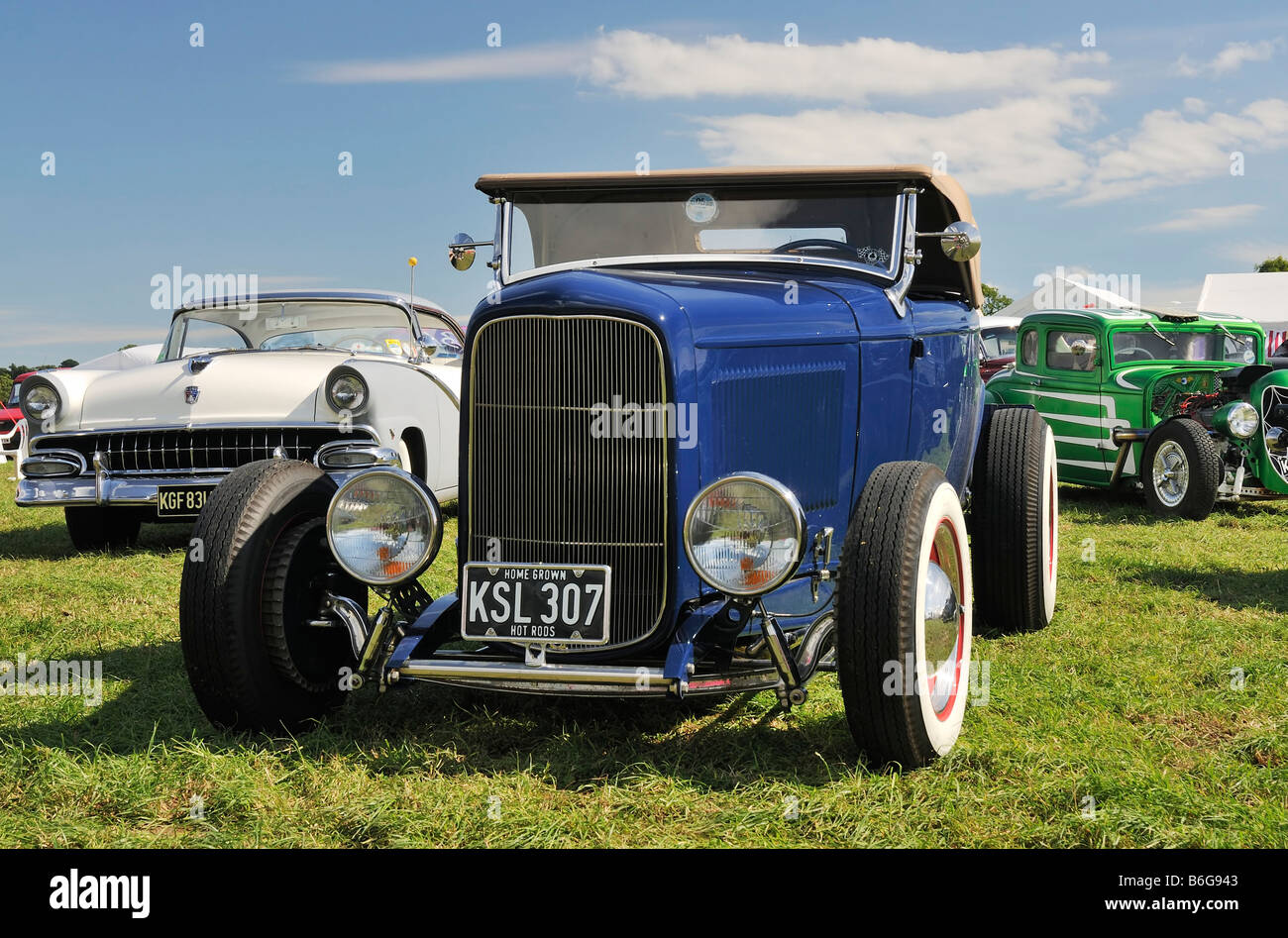 1932 Ford Model B Highboy Hotrod with 1956 Ford behind Stock Photo