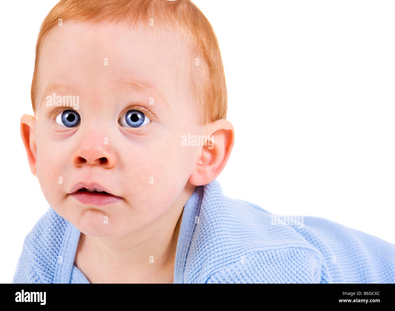 Cute baby boy with big blue eyes Stock Photo Alamy