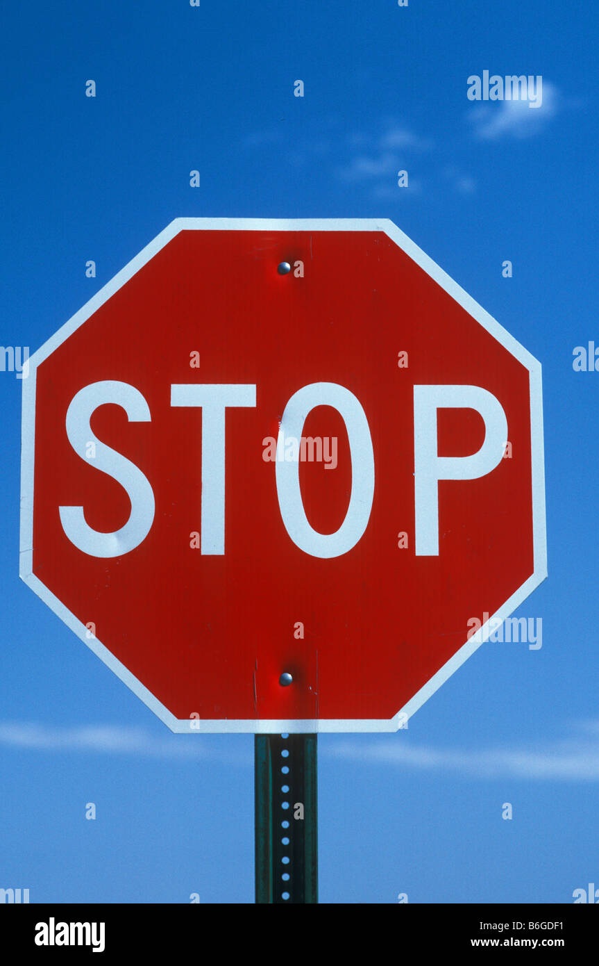 Stop Sign & Street Sign at intersection, USA Stock Photo