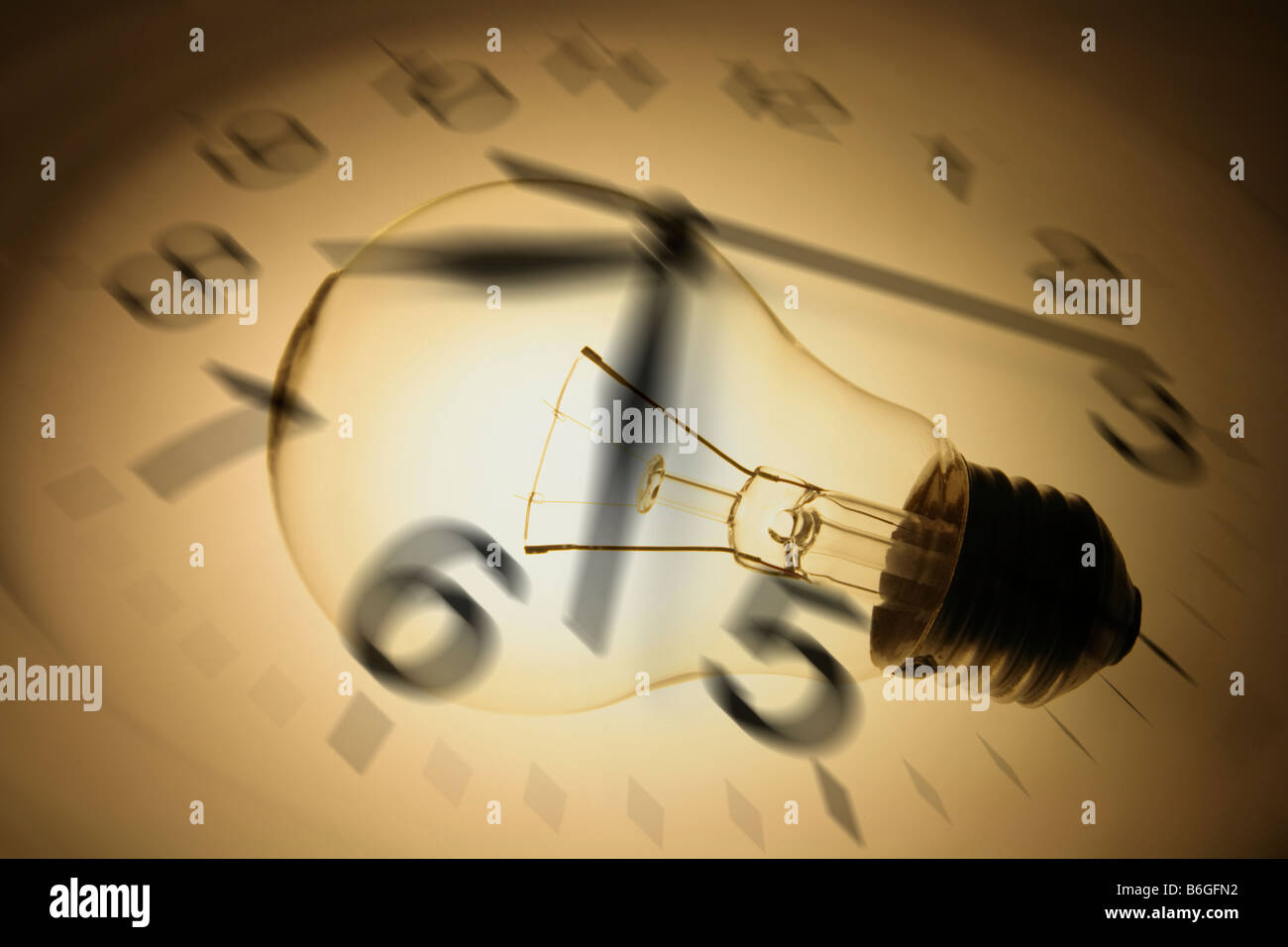 Clock and Light Bulb Stock Photo - Alamy
