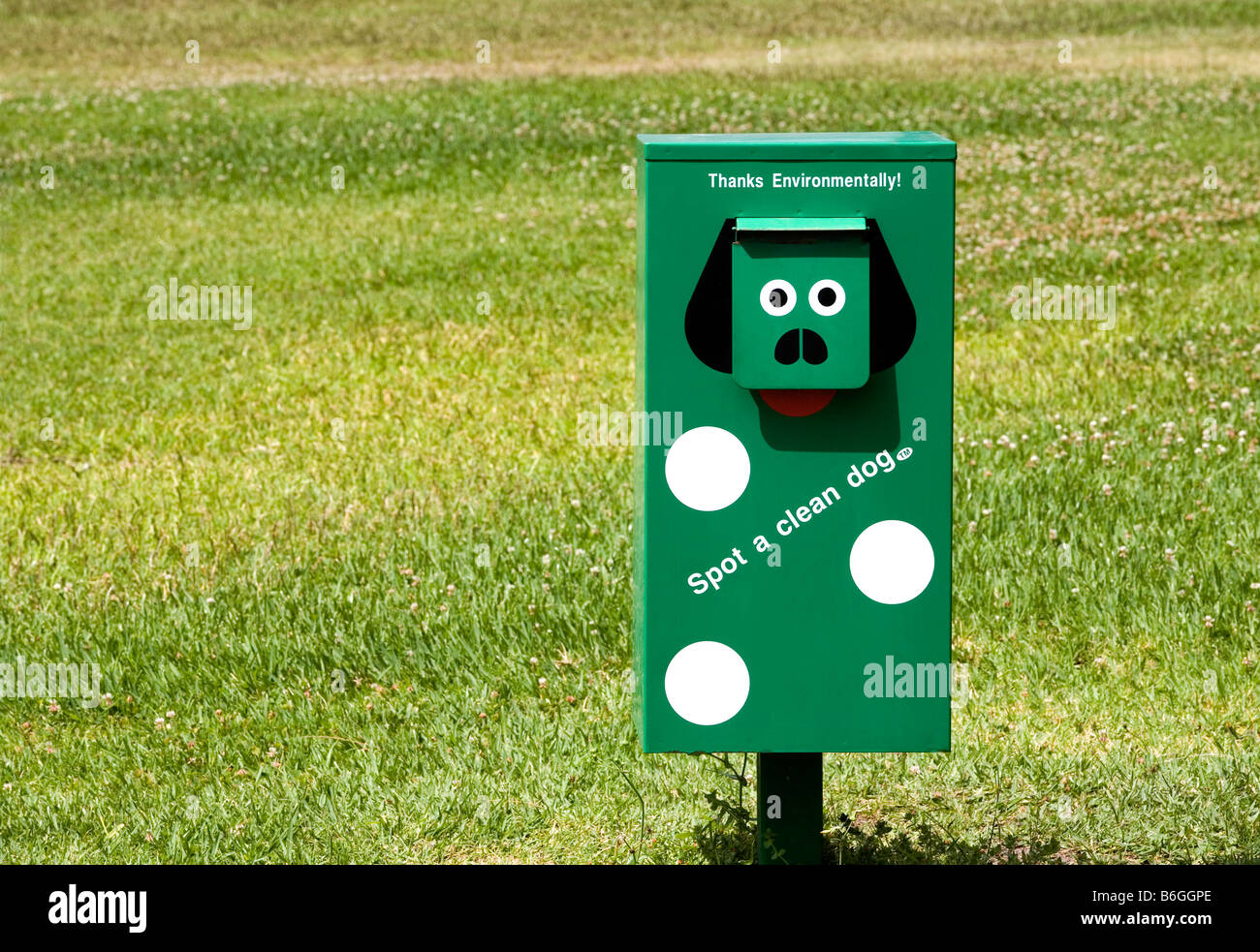 a dog waste bin in a park Stock Photo Alamy