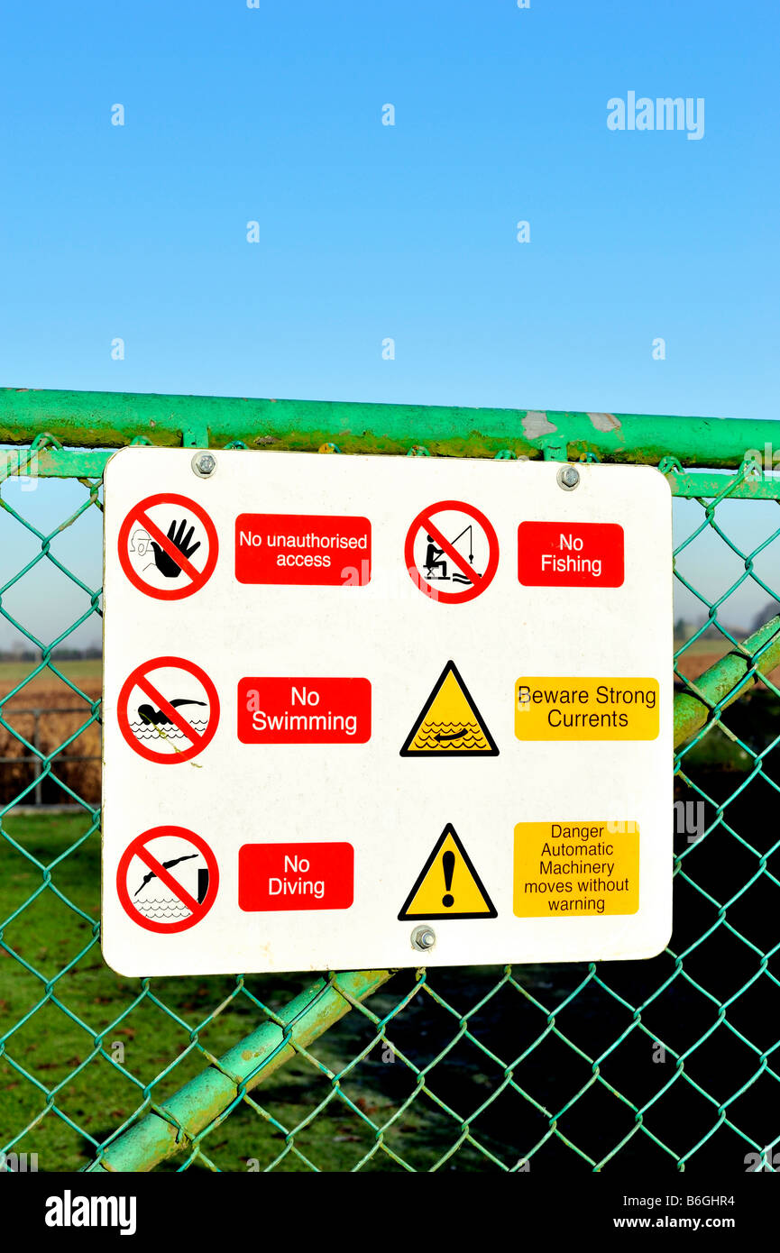 Warning signs on gate KIngs Lynn Norfolk UK Stock Photo Alamy