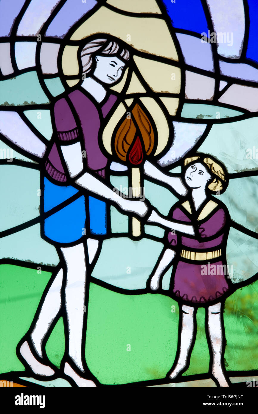 Stained Glass Window Showing Mother Offering Child Baptism Candle