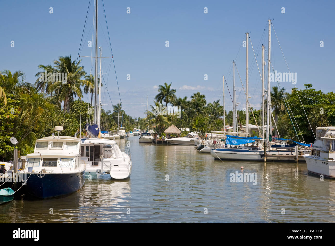 Side canals with waterfront homes and boats at docks along the New