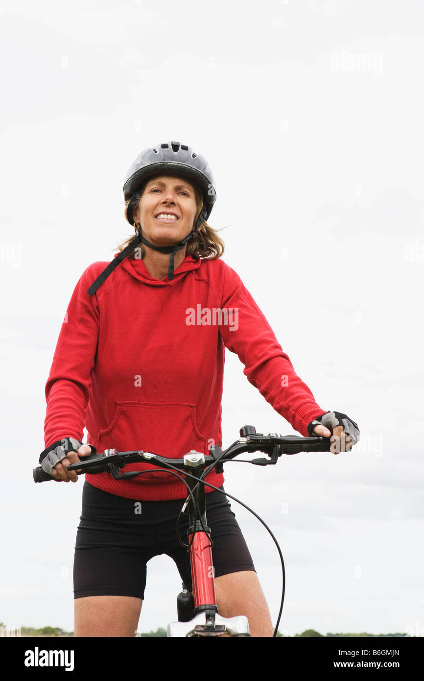 Woman cyclist on bicycle Stock Photo