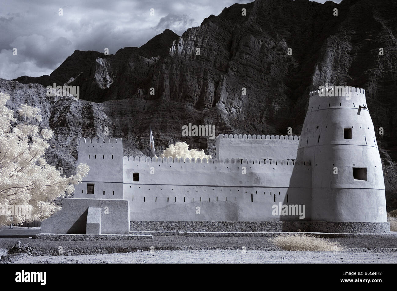 Infrared picture of Bukha Fort, Musandam, Oman using false colour and channel swapping Stock Photo