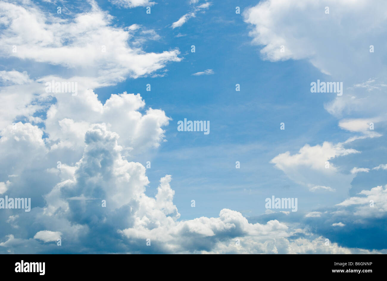 white clouds over deep blue sky background Stock Photo - Alamy