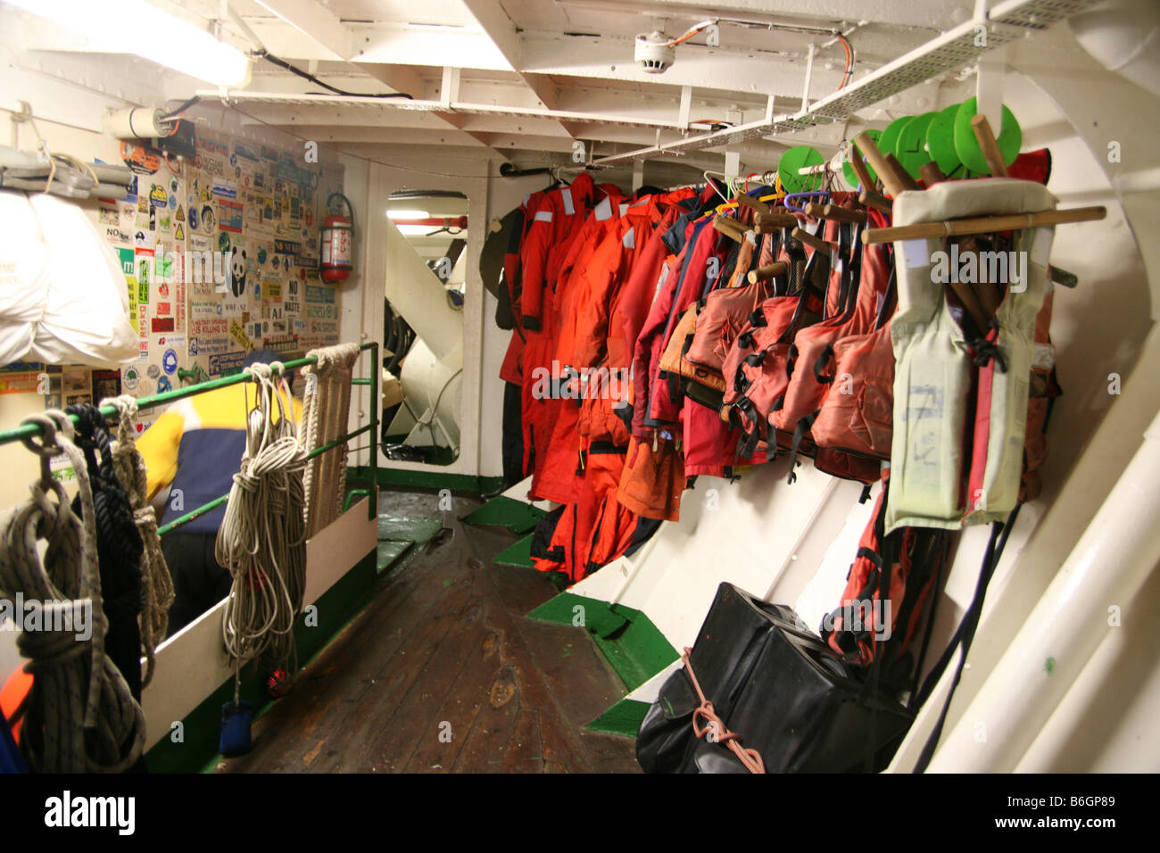 Lifejackets stowed below decks on Greenpeace ship Stock Photo