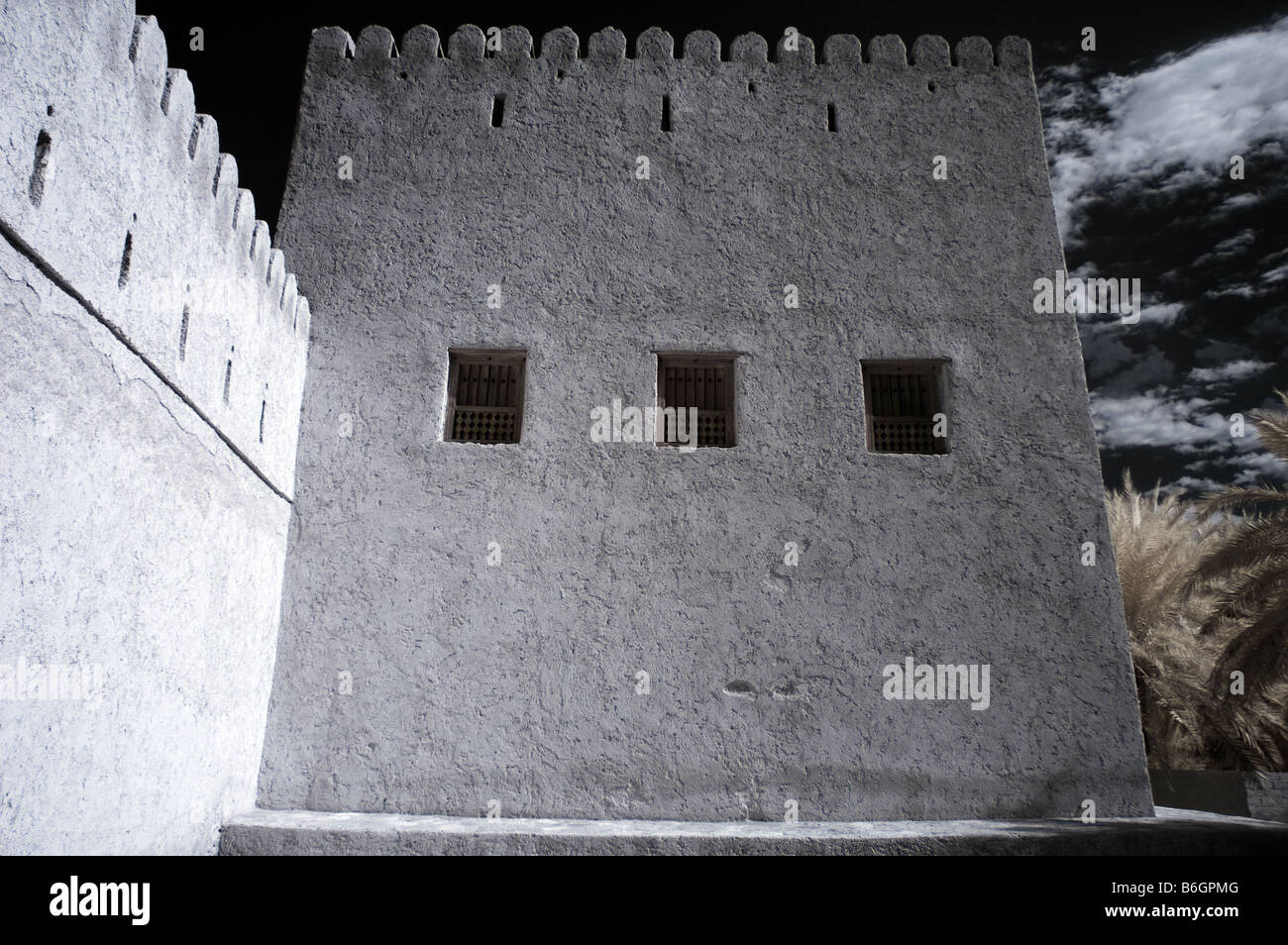 Infrared picture of Khasab Castle, Musandam, Oman using false colour and channel swapping Stock Photo