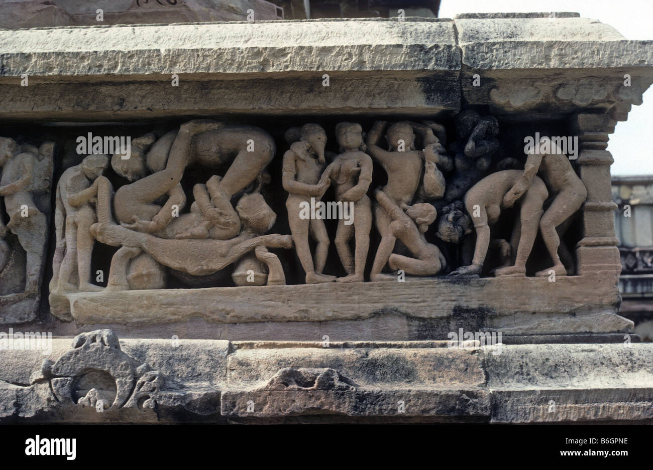 Erotic mid tenth century Tantric carvings of people in stone Khajuraho Madhya Pradesh India Asia A UNESCO World Heritage site Stock Photo