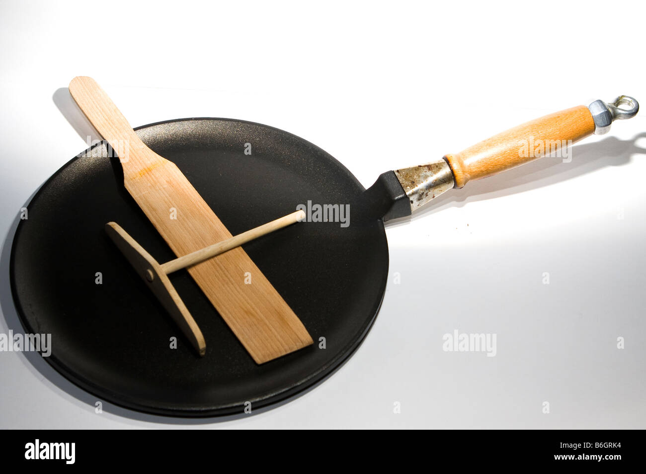 Crepe pancake pan with spreader & turner Stock Photo Alamy