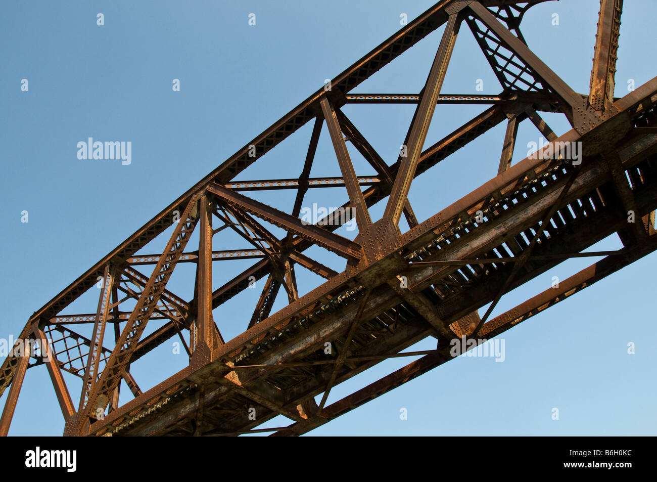 Old steel railroad bridge over Buffalo Bayou, downtown Houston, Texas. Stock Photo