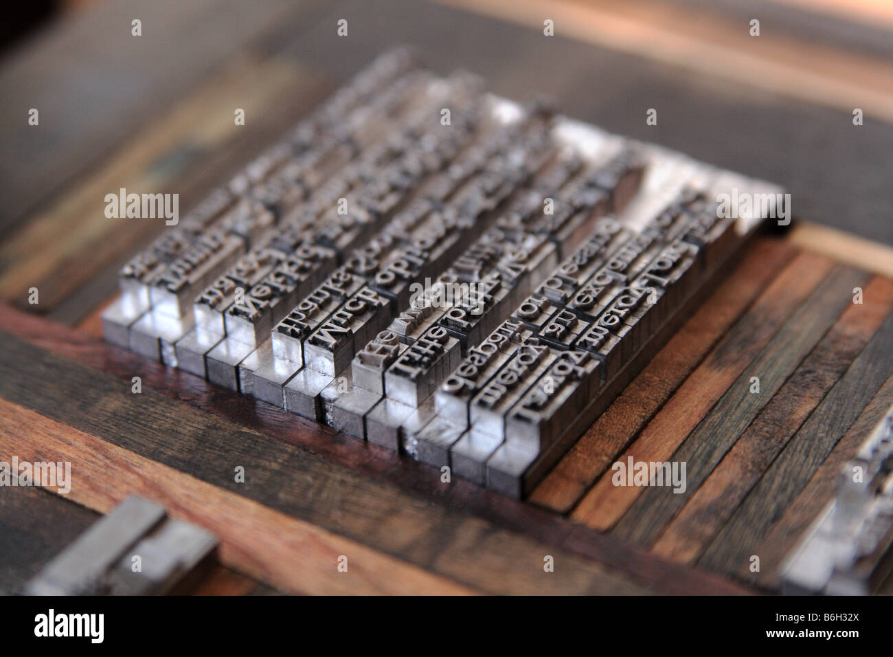 letterpress metal type secured in a chase before inking Stock Photo