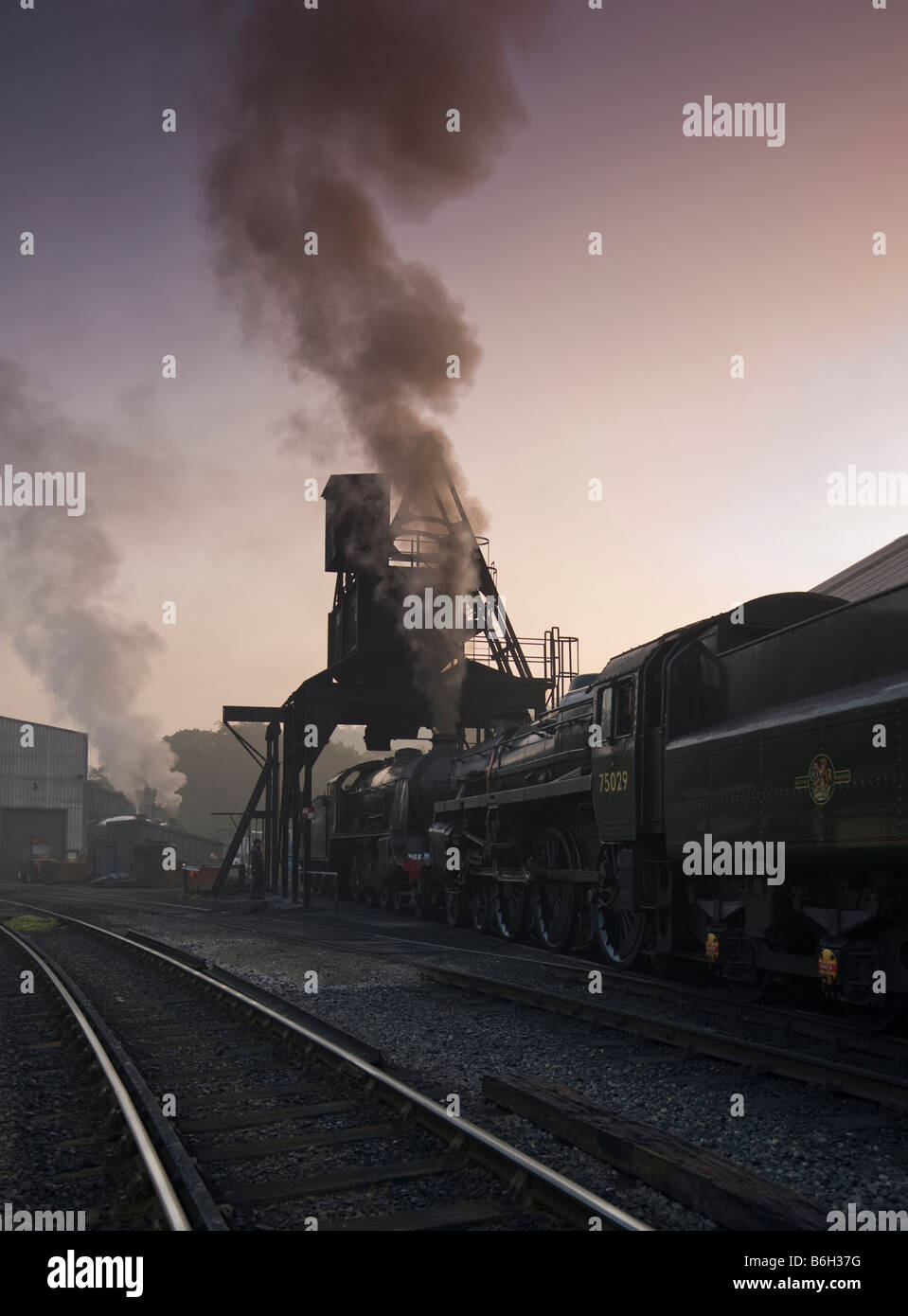 Steam bunkering up with coal on the sheds at Grosmont