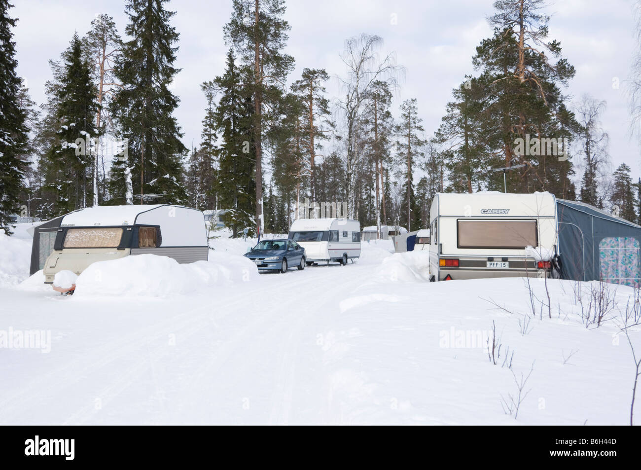 Caravans in the snow in winter, Luosto, Lapland, Northern Finland, Europe, Arctic Stock Photo