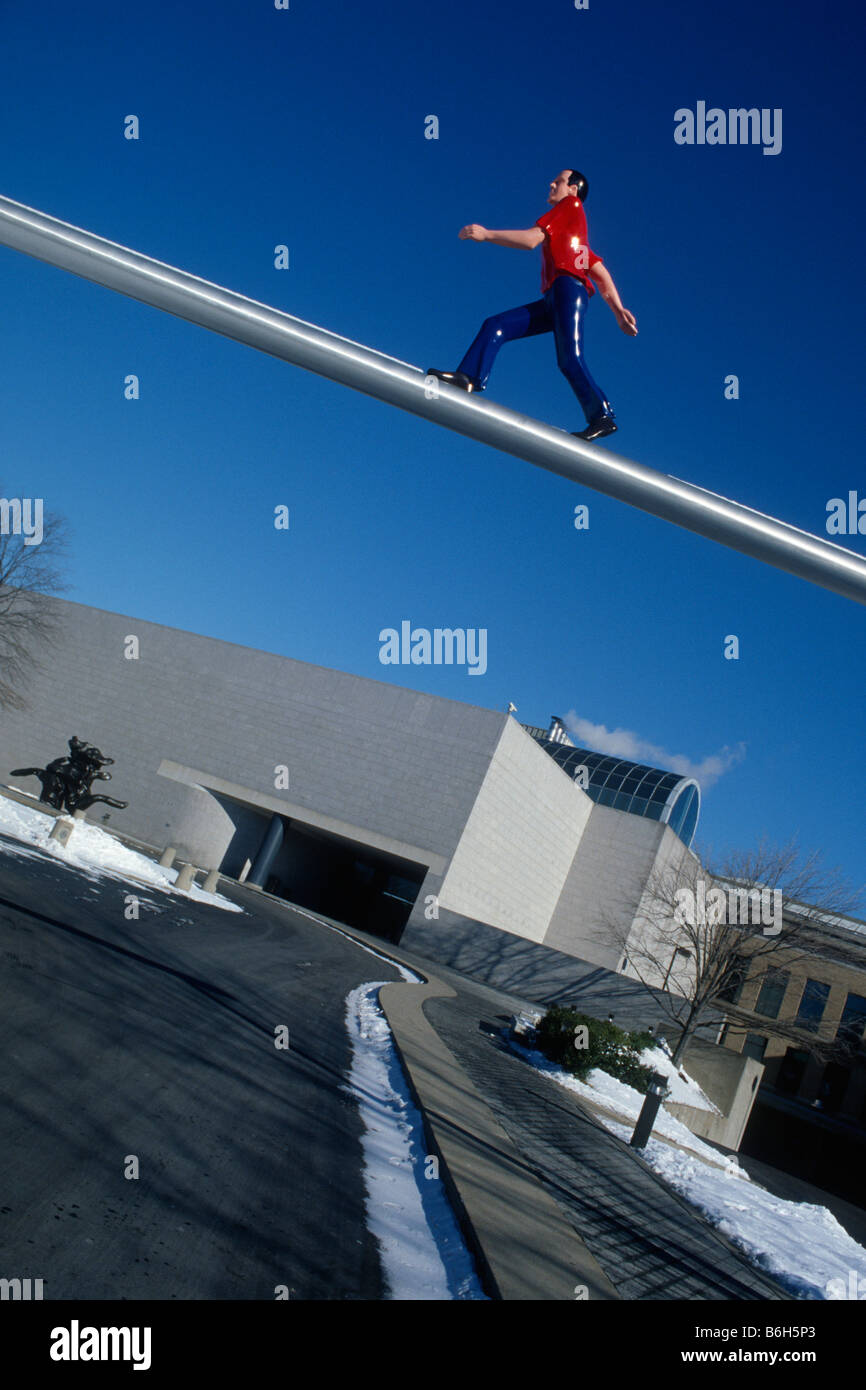 Boston. USA. West Wing of the Boston Museum of Fine Arts & Jonathan Borofsky's Walking Man sculpture. Stock Photo