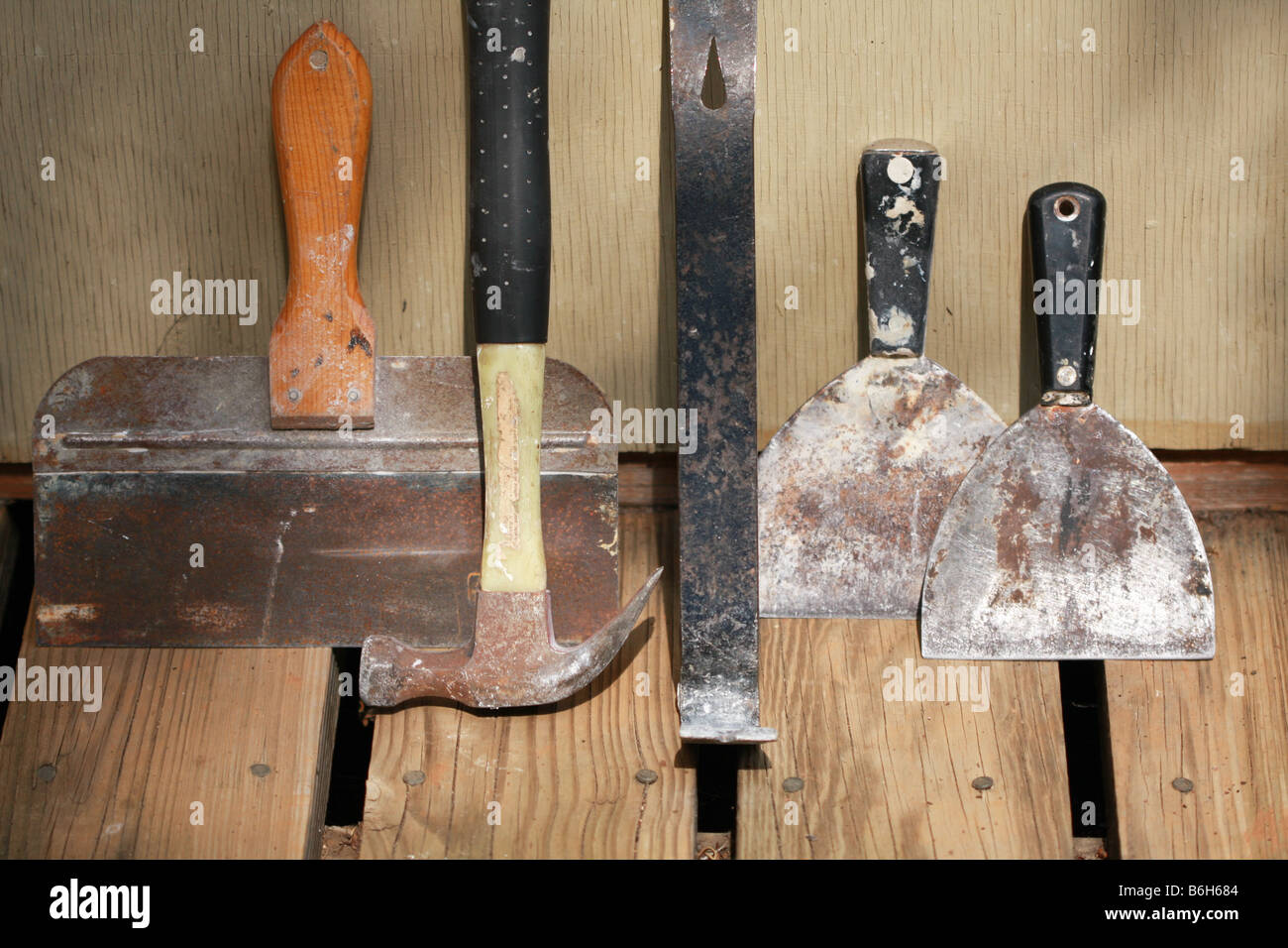 Still life of various tools to remove and install drywall Stock Photo