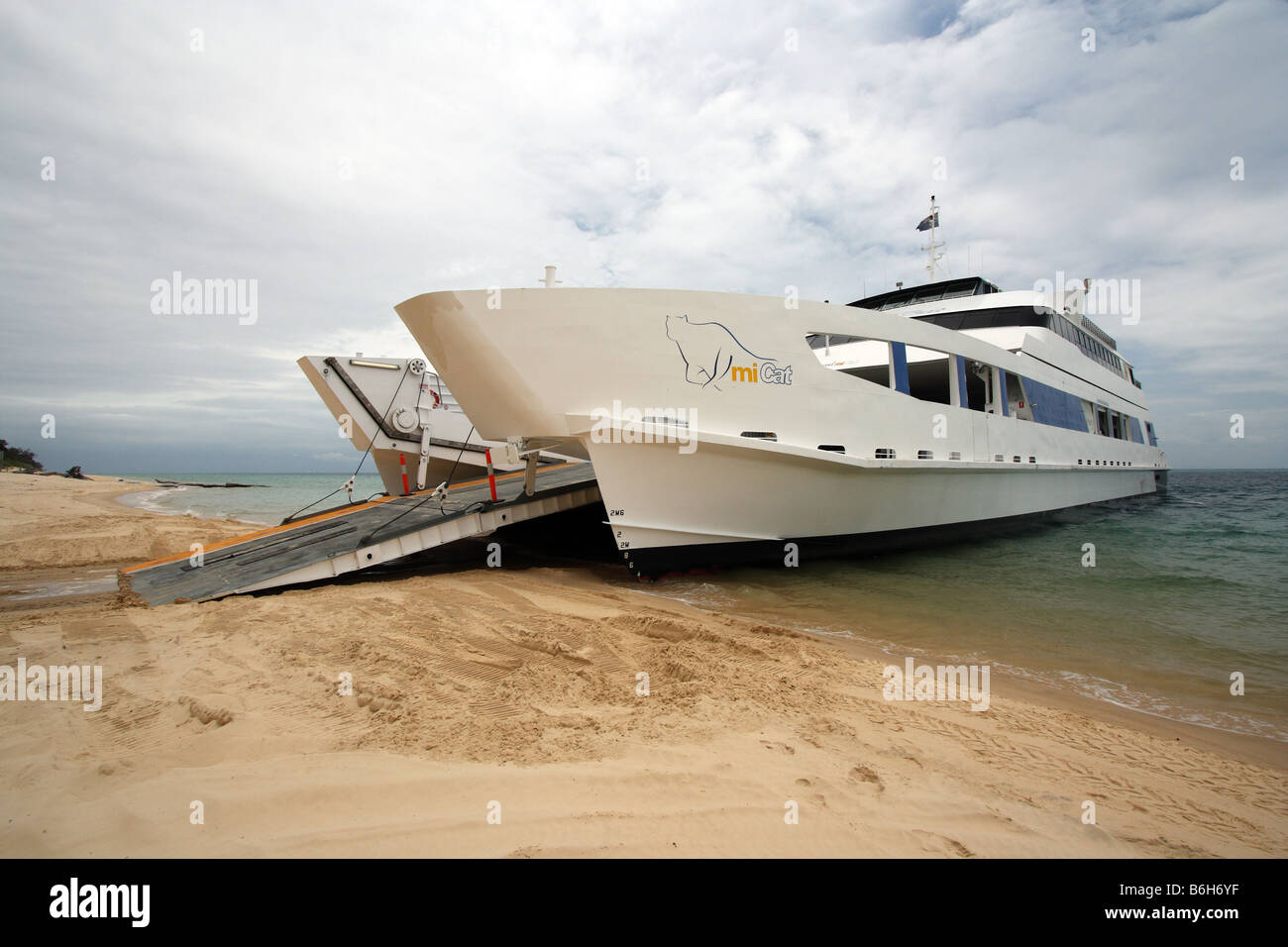 A VEHICULAR TRANSPORT FERRY DOCKED ON A BEACH MORETON ISLAND QUEENSLAND