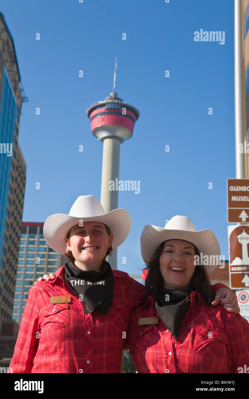 Two girls wearing Stetsons Calgary Stampede Alberta Canada Stock Photo