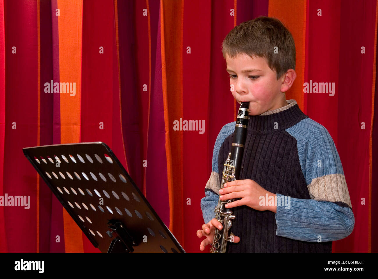 Child clarinet hi-res stock photography and images - Alamy