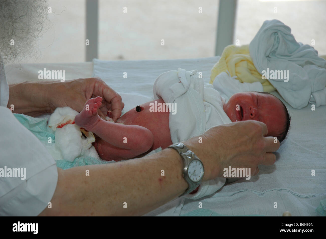 Circumcision Brit Mila Jewish Ceremony done when the baby boy is eight days old Stock Photo - Alamy