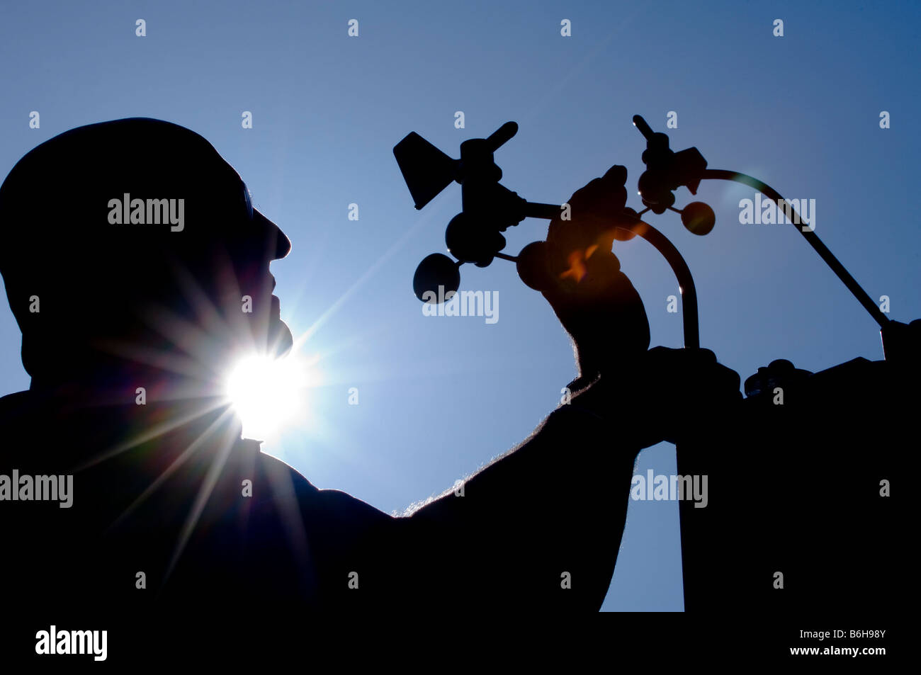 A weather station being adjusted ready for use by specialist Alistair Barron of Weather front Ltd in East Sussex. Stock Photo