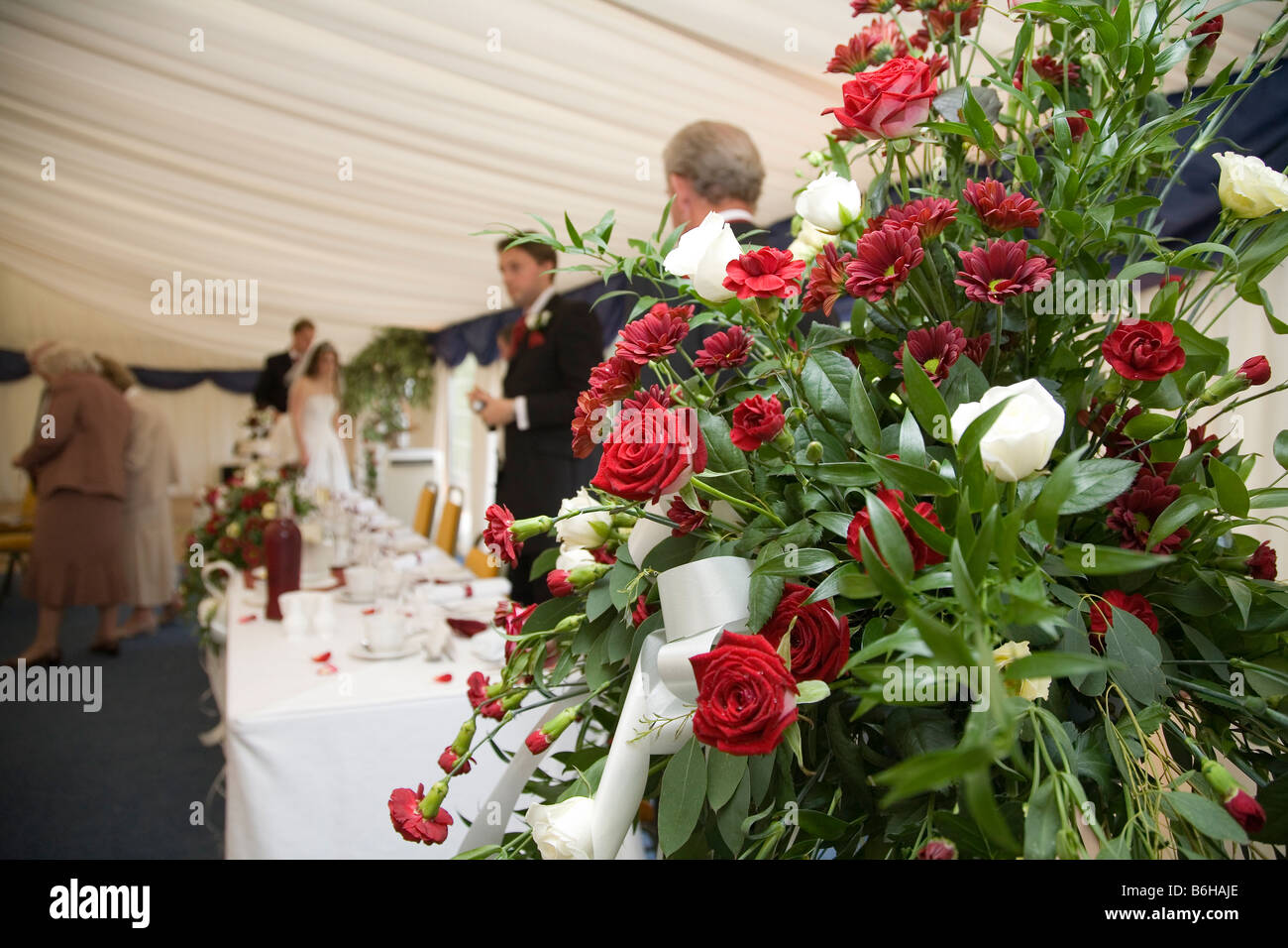Floral display at marque wedding reception Stock Photo