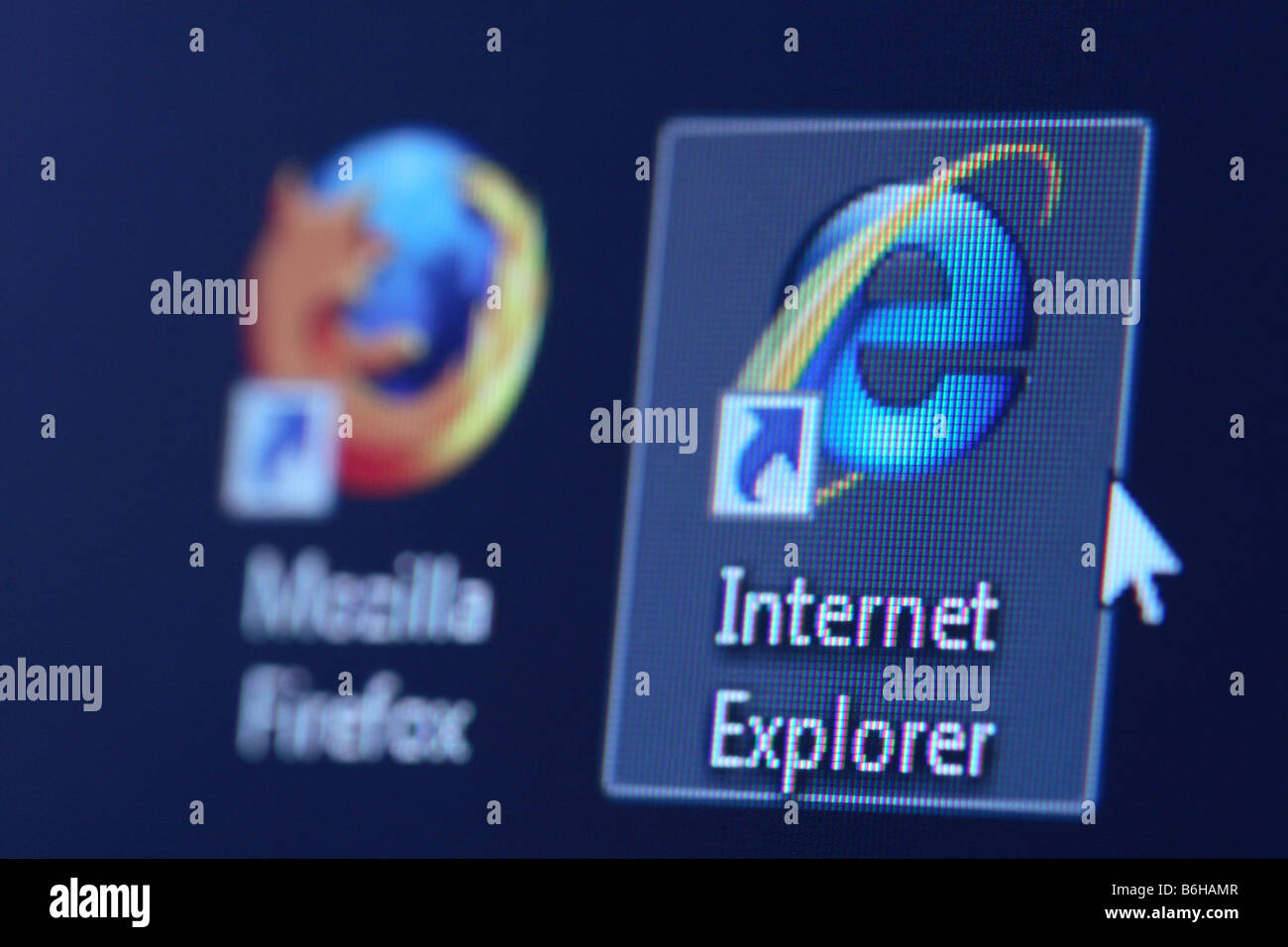 Microsoft Internet Explorer IE web browser software icon alongisde the rival Mozilla Firefox web browser icon Stock Photo