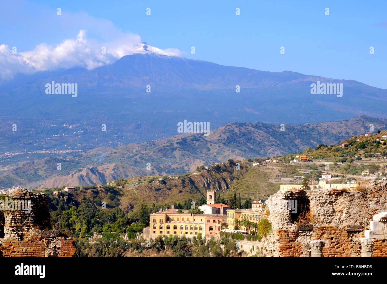 The Ancient Greek Theatre with Mount Etna behind in Taormina in Sicily