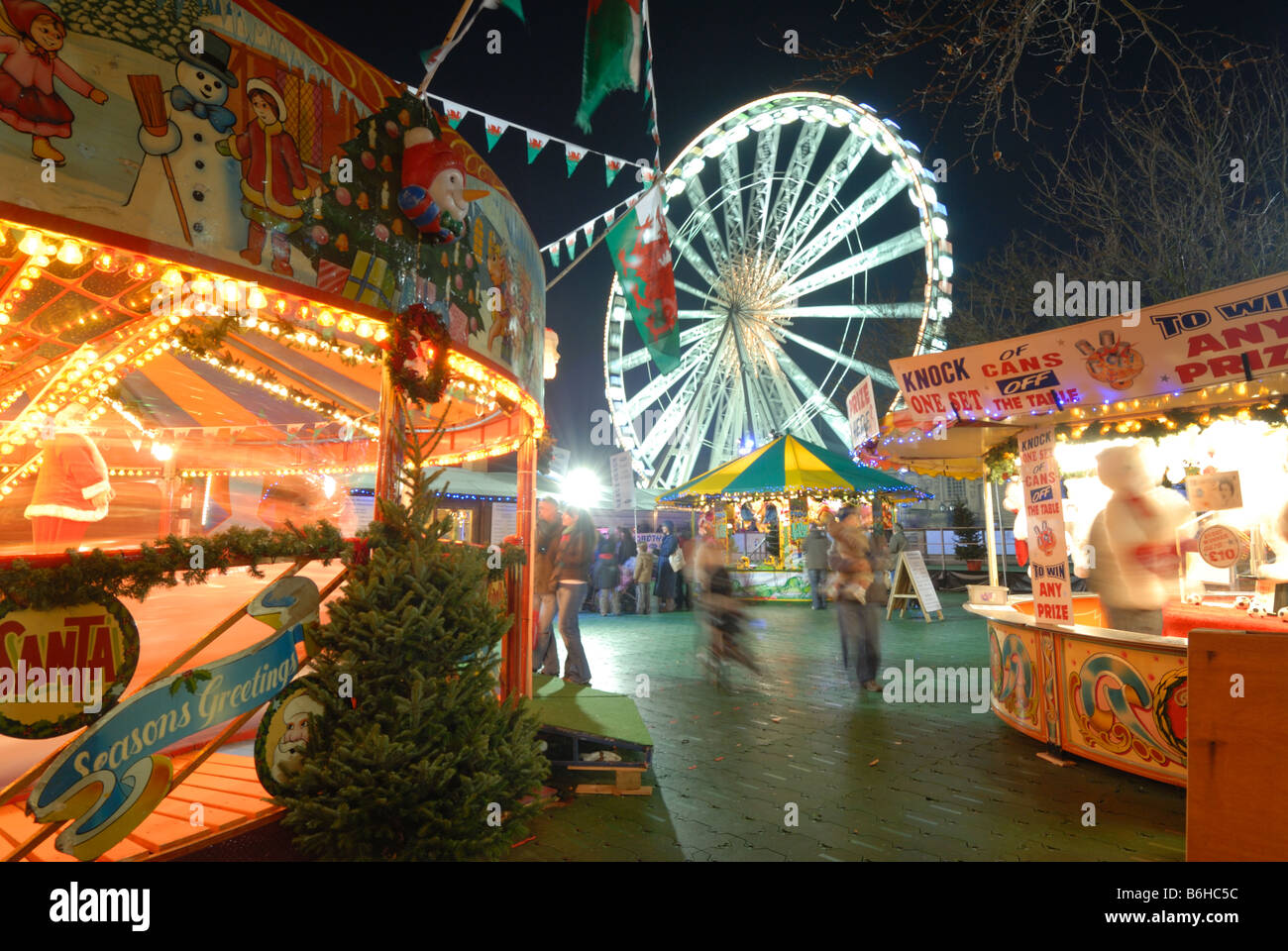 Cardiff Winter Wonderland's carousels and funfair in front of the