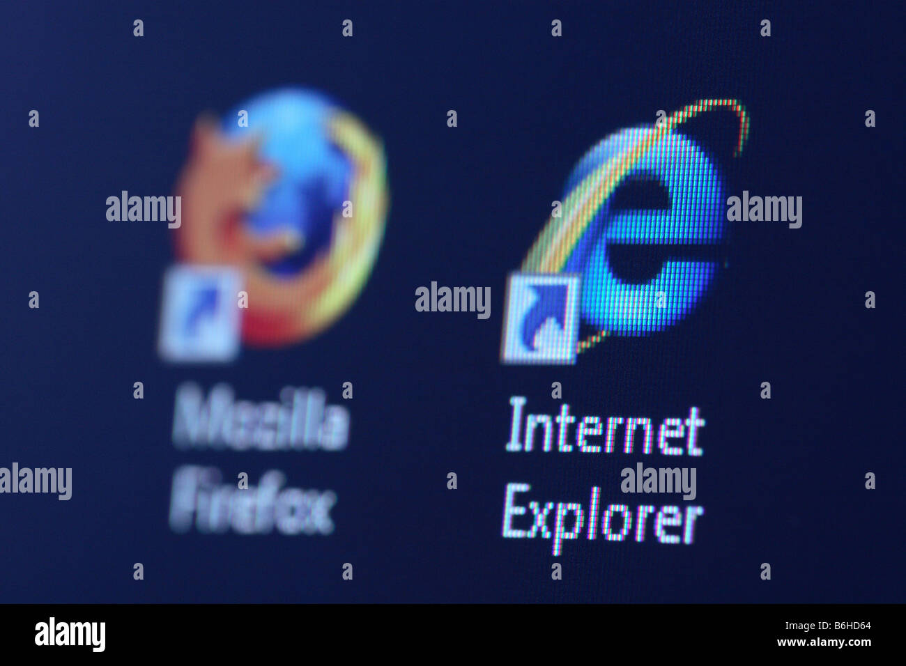 Microsoft Internet Explorer IE web browser software icon alongisde the rival Mozilla Firefox web browser icon Stock Photo