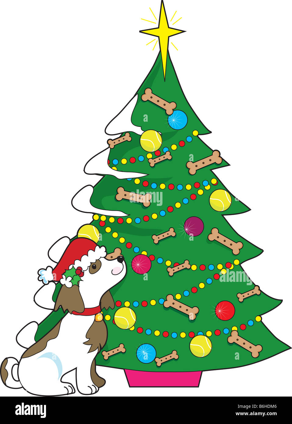 A spotted dog looks up at a Christmas that is decorated with tennis balls and dog biscuits Stock Photo