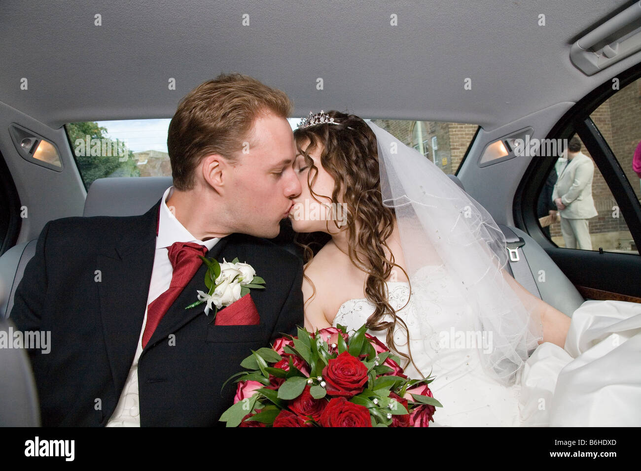 Bride groom kissing in car hi-res stock photography and images - Alamy