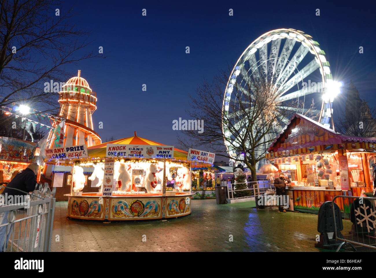Cardiff Winter Wonderland's carousels and funfair in front of the