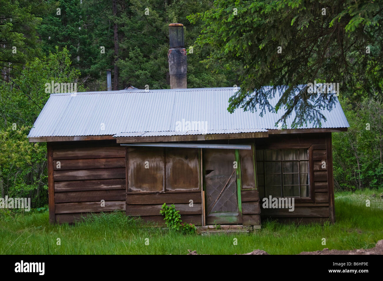 Exterior of old wooden clapboard cabin in Colorado Stock Photo