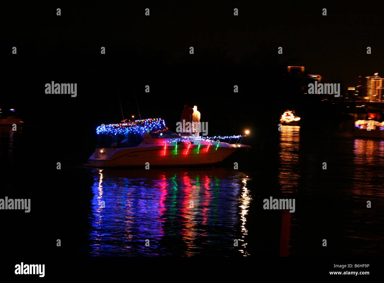 Boat decorated with christmas lights on the James river, part of an