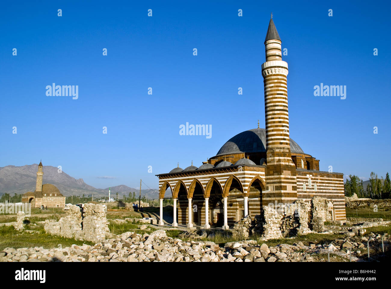 Old Van's Kaya Celebi Mosque with similar Husrev Pasa Mosque in distance Stock Photo