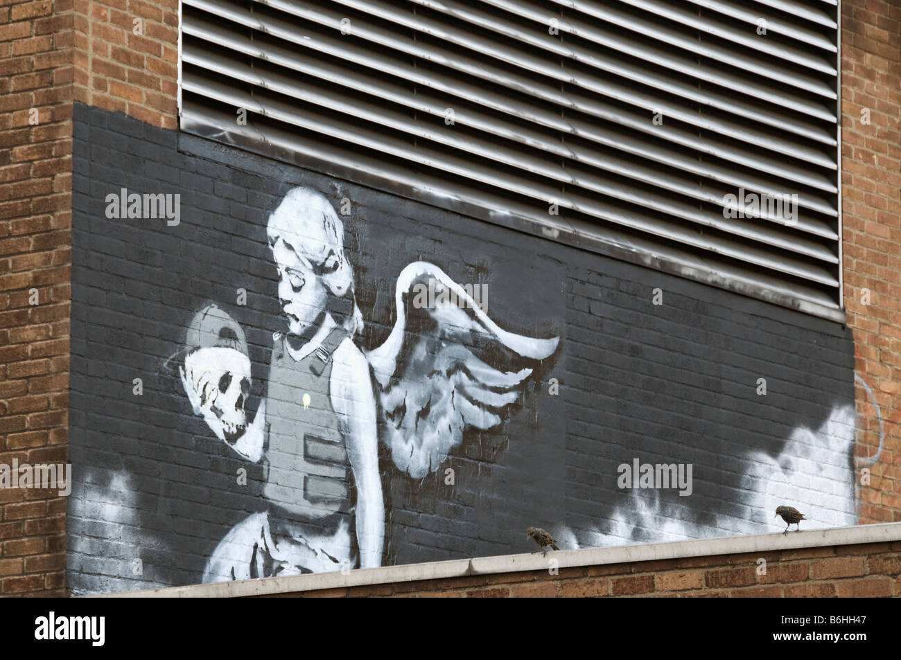 The Angel of Old Street, Banksy graffiti, Old Street, London, UK Stock Photo