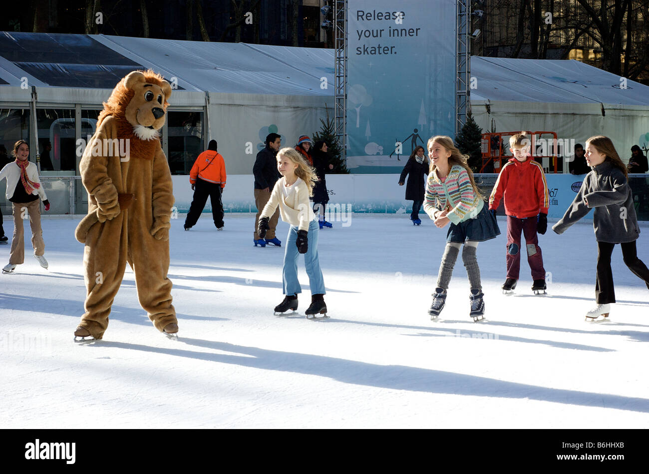 Girls Ice Skating with Lion Mascot in Bryant Park New York (For