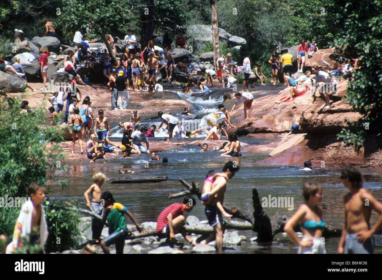 Crowds of people enjoy Slide Rock in the river in Sedona, Arizona, USA. Stock Photo