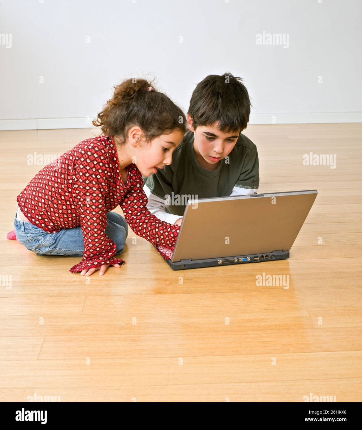 7,991 kids desktop computer stock photos, high-res... two kids with laptop computer on the floor Stock Photo - Alamy