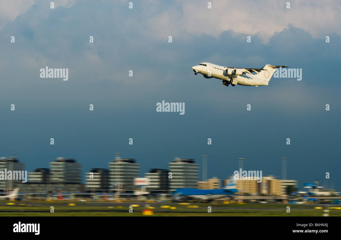 a plane take off at schiphol airport in amsterdam the netherlands Stock Photo