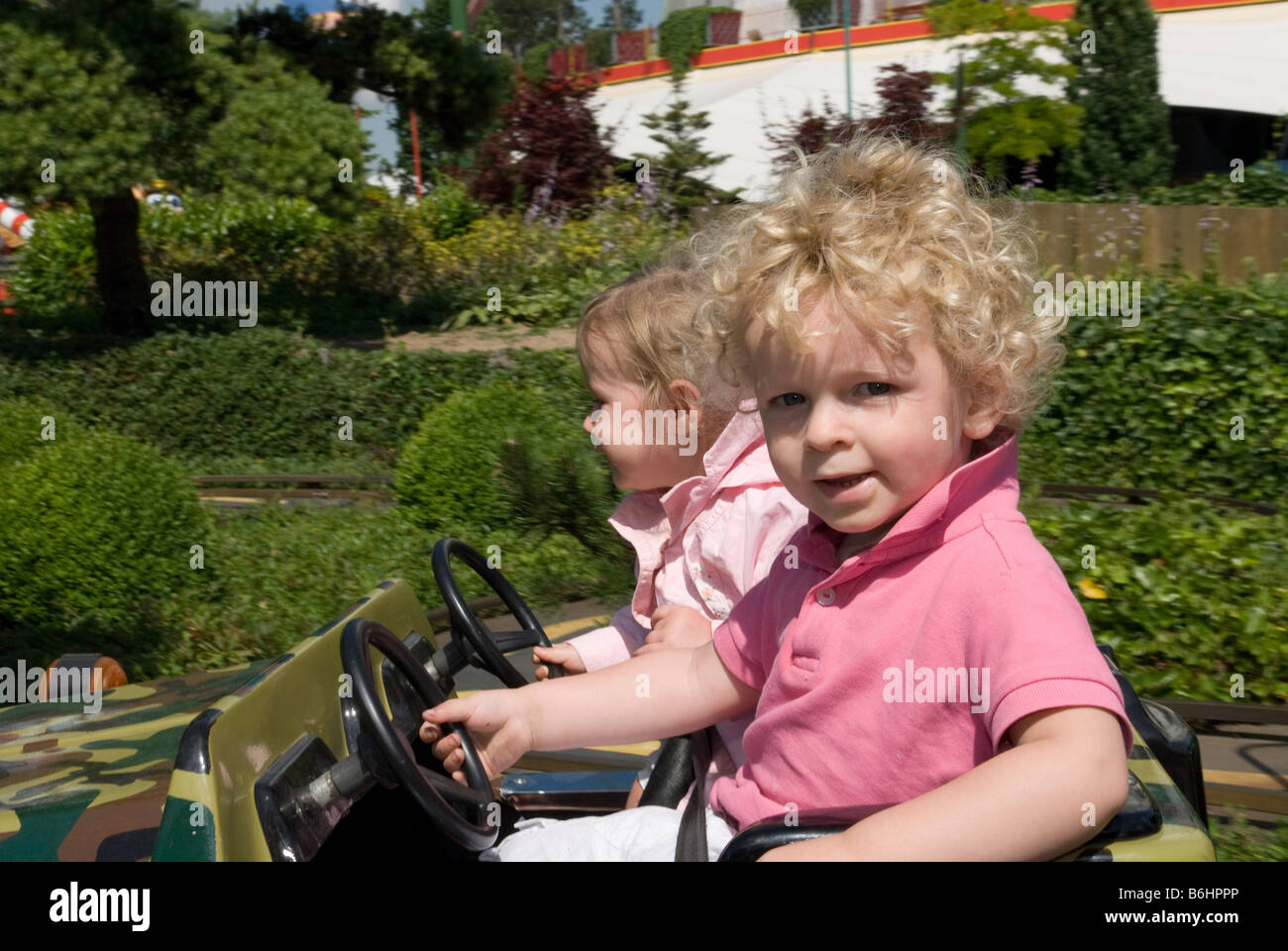 cute young boy and girl in a car Stock Photo