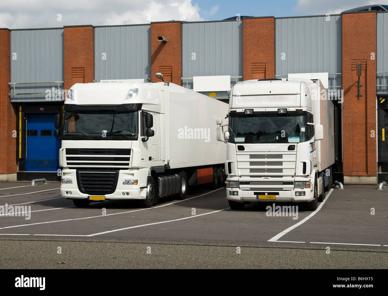 big trucks at a loading dock Stock Photo
